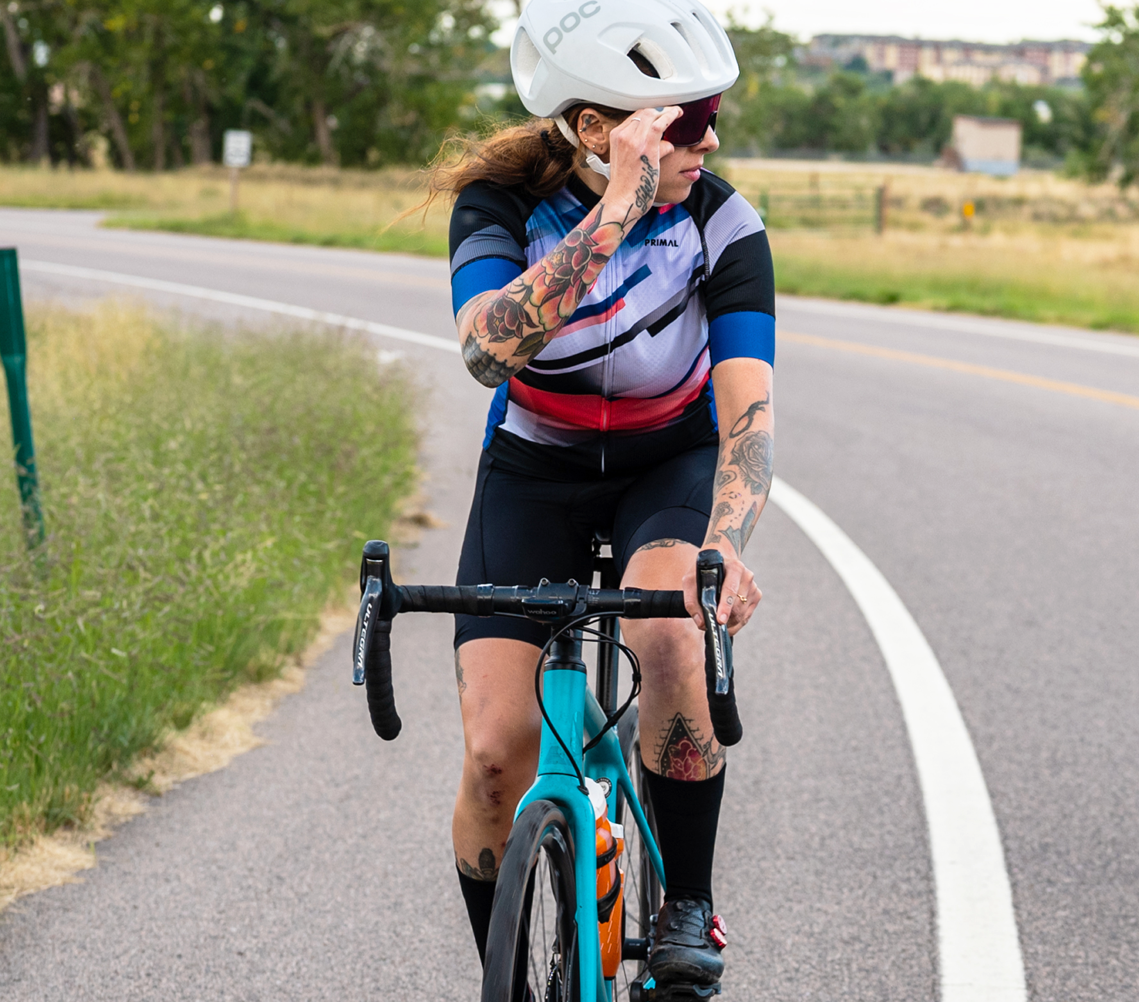 cyclist wearing helmet and padded shorts flat surface